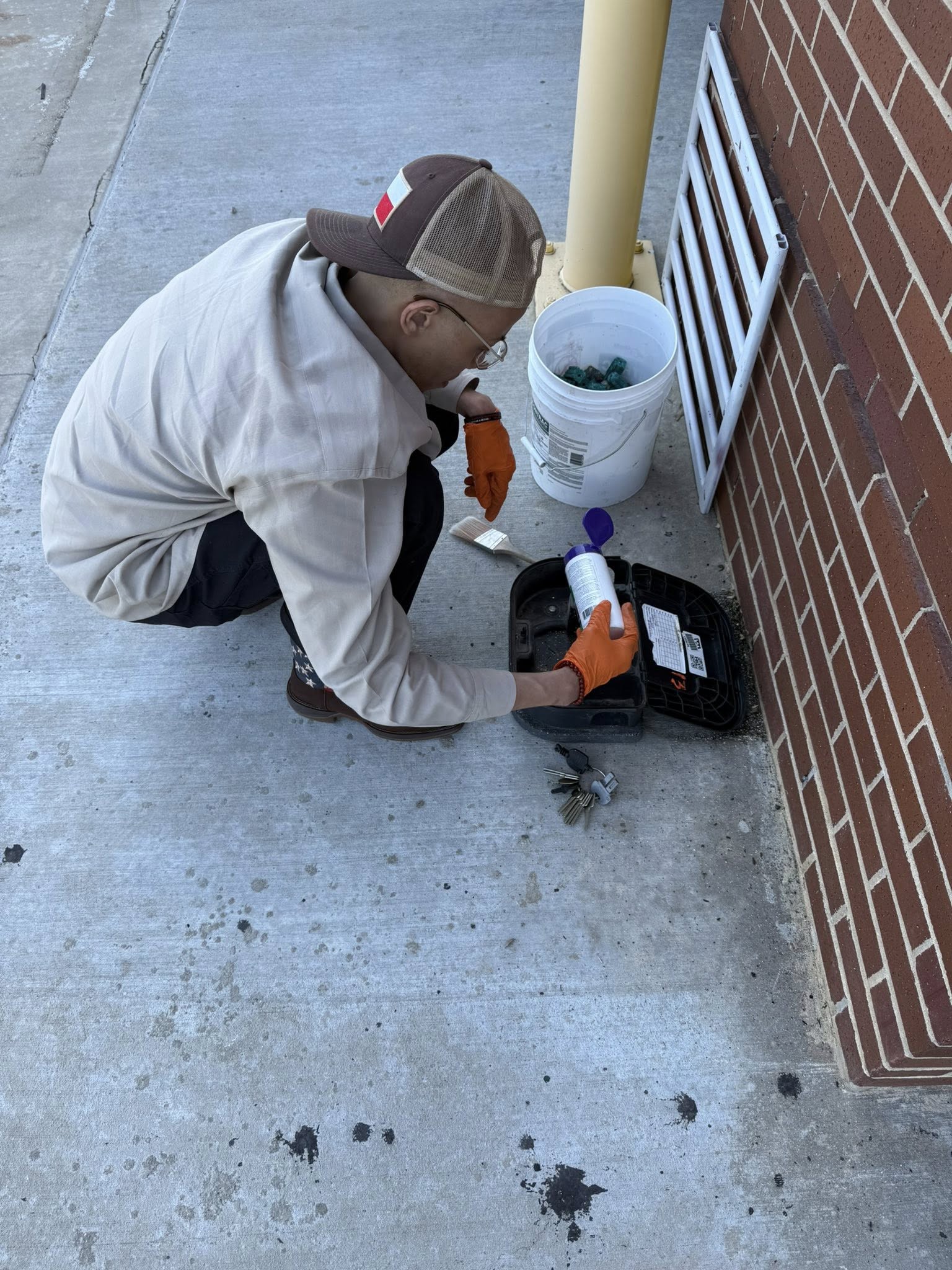 Technician treating an outdoor area